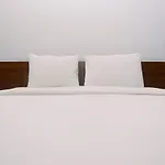 Cozy And Minimalist Studio Patraland Urbano Apartment Near Bekasi Station By Travelio